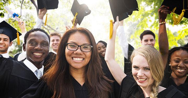 Diverse group of students in their graduation outfits - Connections Academy